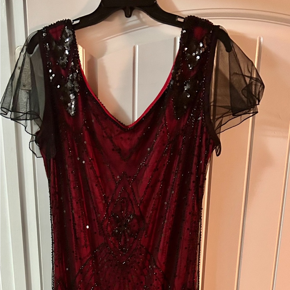 Wine and black dress with beaded details.  20’s style full length